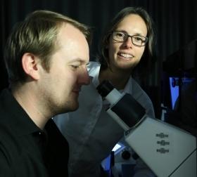 Professor Kat Gaus and postdoctoral student Dr Elvis Pandzic with one of the super-resolution microscopes at UNSW's Centre in Single Molecule Science.